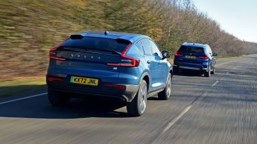 Volvo C40 following BMW iX1 - rear